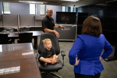 Constituent Kaley Bastine joins Senator Lindsey Williams for a tour of the Capitol Police facility. Kaley has raised over $10,000 for the Harrison Police Department in 2019.