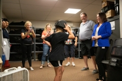Constituent Kaley Bastine joins Senator Lindsey Williams for a tour of the Capitol Police facility. Kaley has raised over $10,000 for the Harrison Police Department in 2019.