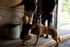 Constituent Kaley Bastine joins Senator Lindsey Williams for a tour of the Capitol Police facility. Kaley has raised over $10,000 for the Harrison Police Department in 2019.